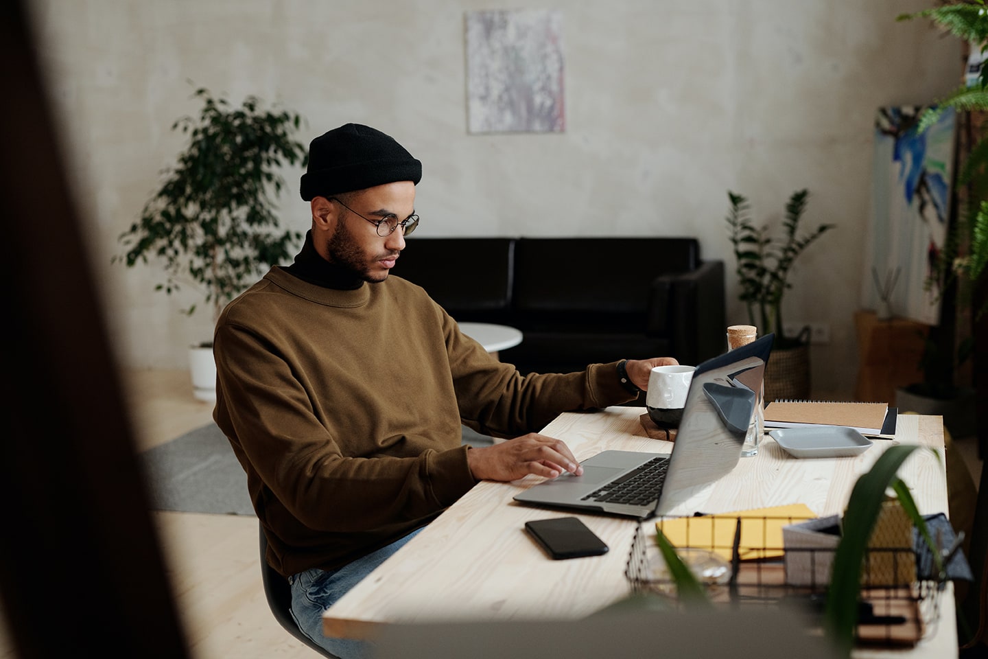 Man looking at his laptop